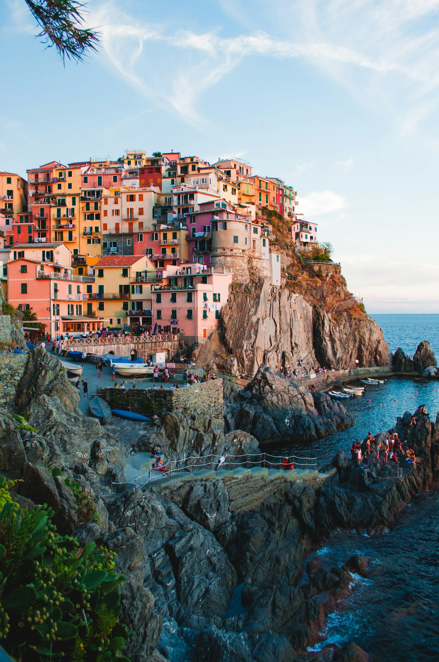 Panoramic clifftop coastal village overlooking azure Mediterranean waters